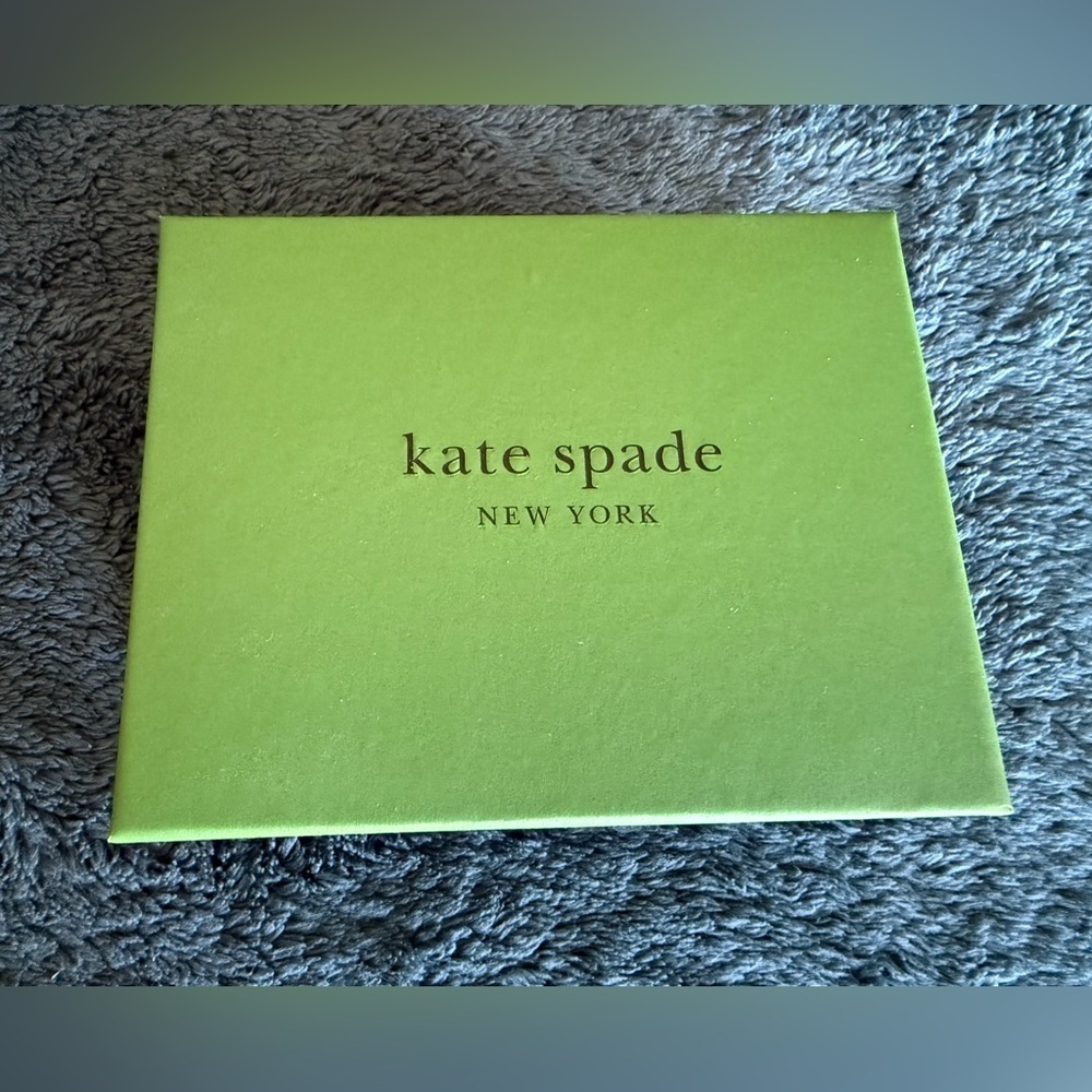 Kate Spade green jewellery box with red wrapping paper approximately 4.5x6 inch